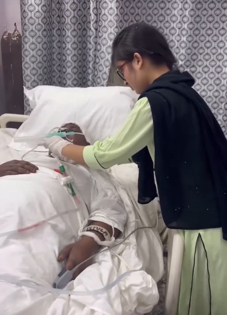 Nurse providing critical care support to a patient